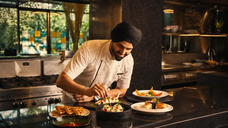 Home cook styling food at the table