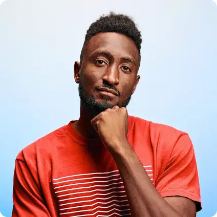 Tech creator in a studio headshot